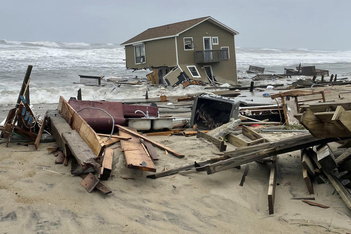 2 North Carolina beach houses collapse into Atlantic surf