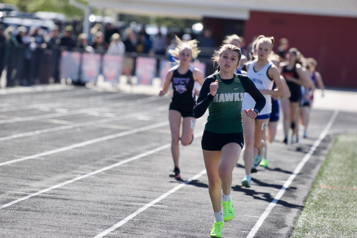 Woodward-Granger's Eva Fleshner competes in the 3,000-meter run during the West Central Activities Conference meet on Tuesday, May 2, 2023, in Earlham.