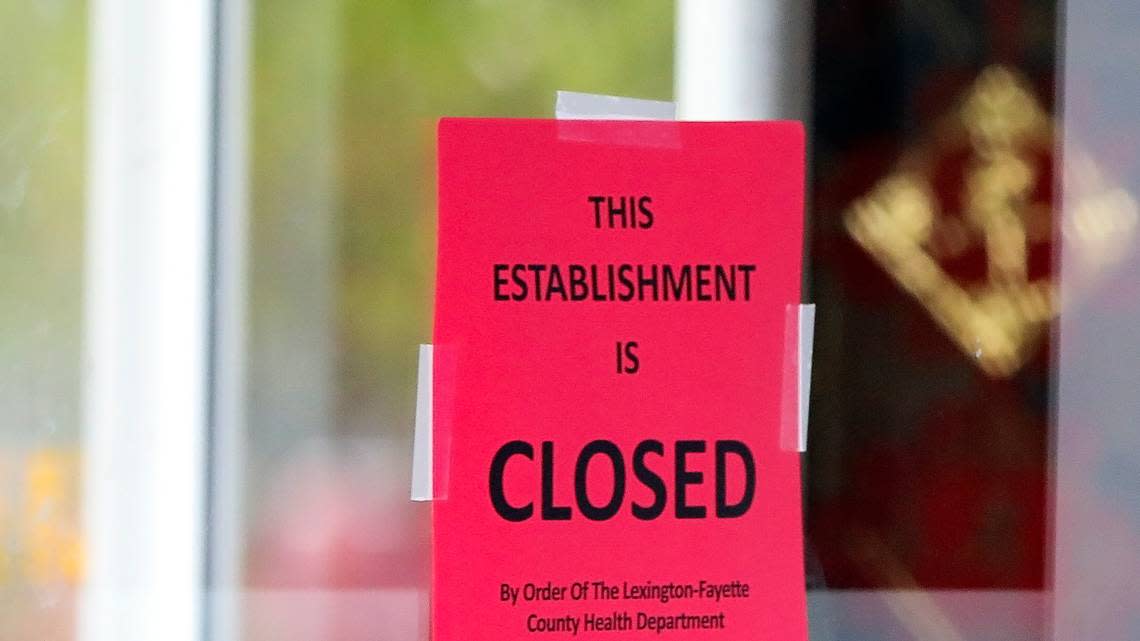 A closed sign placed by the Lexington-Fayette County Health Department on a Lexington restaurant after violations were found on the site.