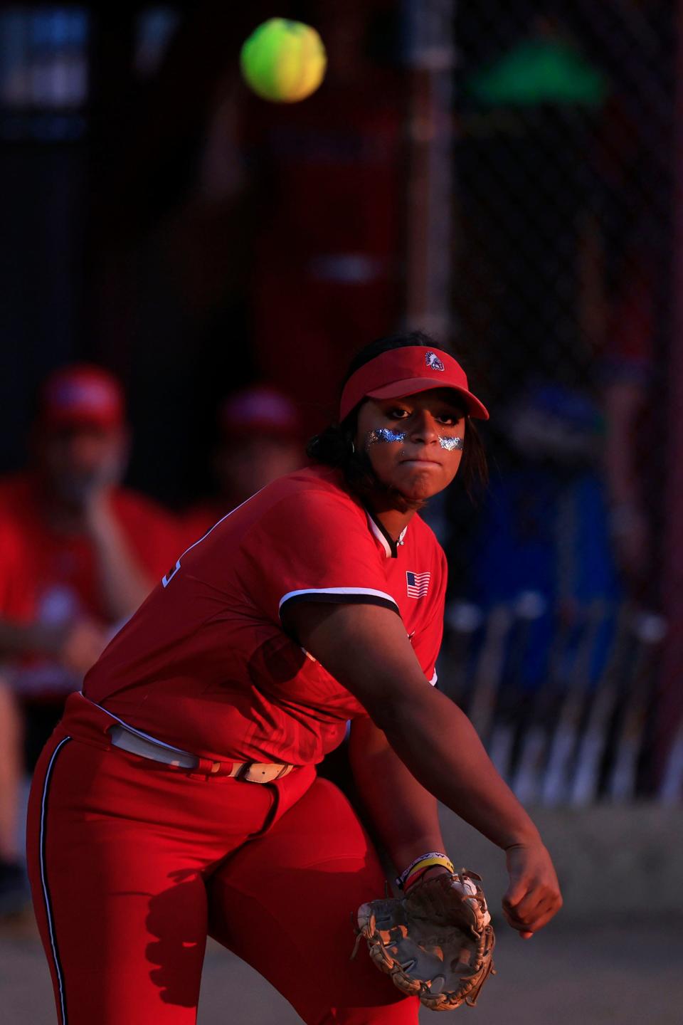 Baldwin's Jazmine Ramos-Merced (21) fires an out to first base during the 2023 softball postseason.