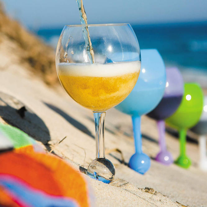 These Genius Wine Glasses Stick In The Sand And Float In The Pool