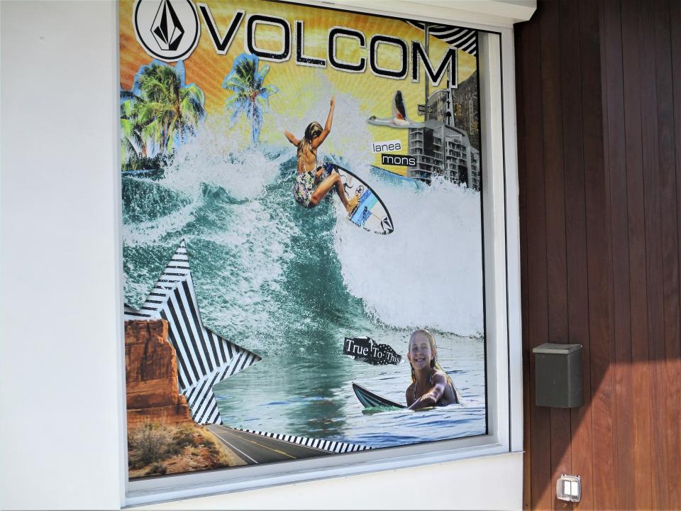 This mural at Sunrise Surf Shop in Jacksonville Beach depicts 13-year-old Lanea Mons, a local teen making a name for herself in surfing competitions.