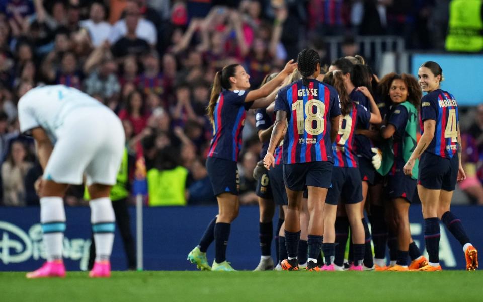 Barcelona celebrate after beating Chelsea 2-1 on aggregate to reach the Women's Champions League final - Chelsea closing the gap –  but still fall short as Barcelona reach Women's Champions League final - Getty Images/Alex Caparros