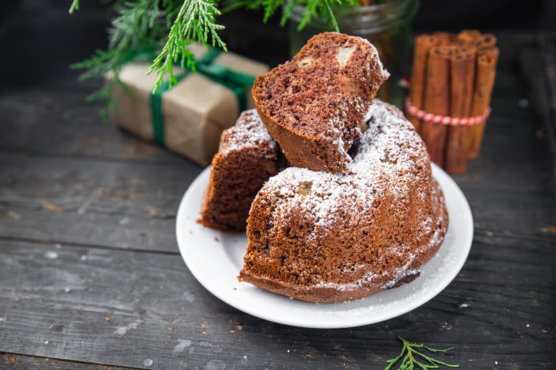 christmas cake homemade cakes sweet dessert christmas card new year sponge cake chocolate spicy aroma of ginger, cinnamon, vanilla, anise holiday gift food background rustic top view copy space