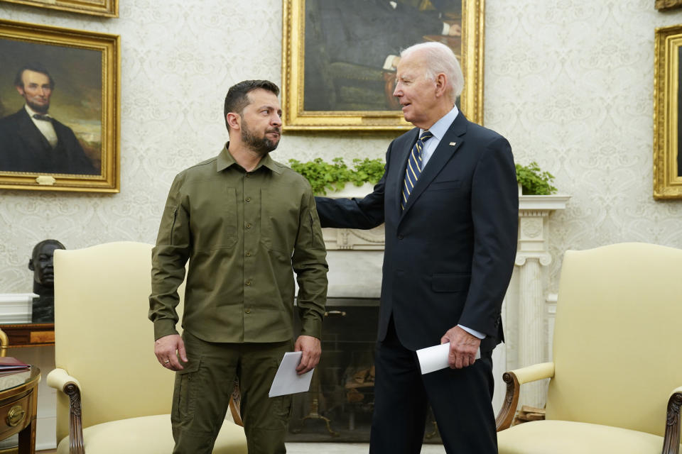 FILE - President Joe Biden meets with Ukrainian President Volodymyr Zelenskyy in the Oval Office of the White House, Thursday, Sept. 21, 2023, in Washington. A deal to provide further U.S. assistance to Ukraine by year-end appears to be increasingly out of reach for President Joe Biden. Republicans are insisting on pairing the funding with changes to America’s immigration and border policies. (AP Photo/Evan Vucci, File)
