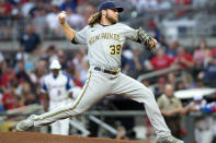 Milwaukee Brewers starting pitcher Corbin Burnes throws during the first inning of a baseball game against the Atlanta Braves, Friday, July 30, 2021, in Atlanta. (AP Photo/Hakim Wright Sr.)