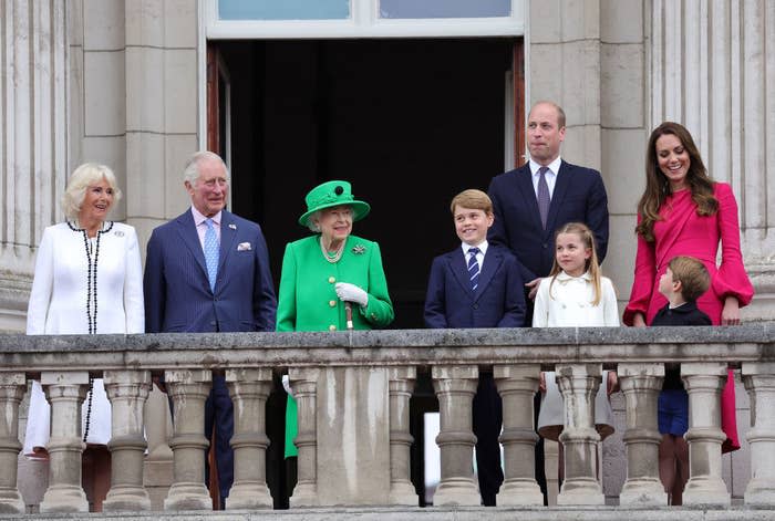 the British royal family standing on a balcony