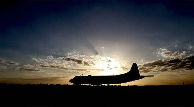 Japan Maritime Self-Defense Force's P-3C Orion aircraft sits on the tarmac after arriving at Royal Australian Air Force Pearce Base to help with search operations for the missing Malaysia Airlines Flight MH370. Photo: AP.