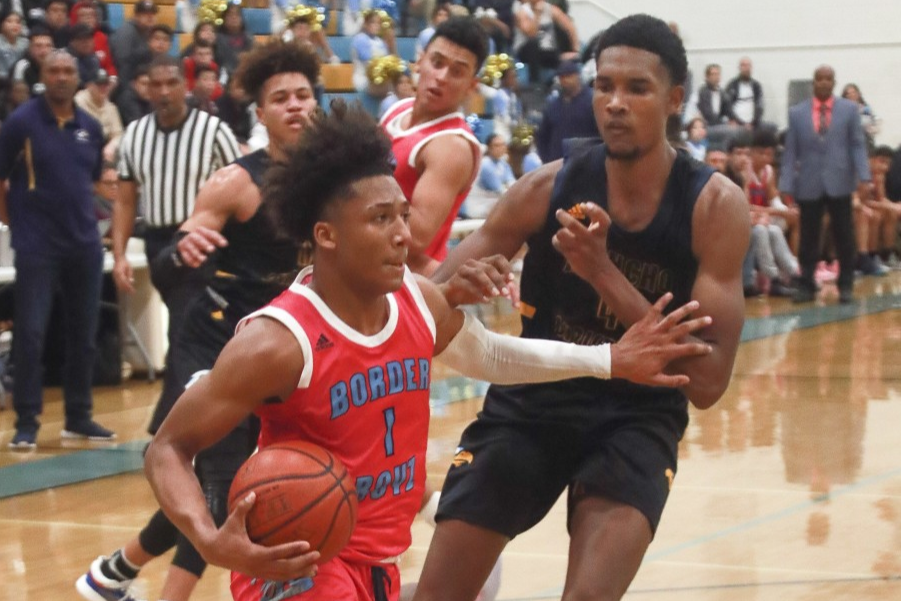 Evan Mobley defends San Ysidro's Mikey Williams while playing for Rancho Christian High.