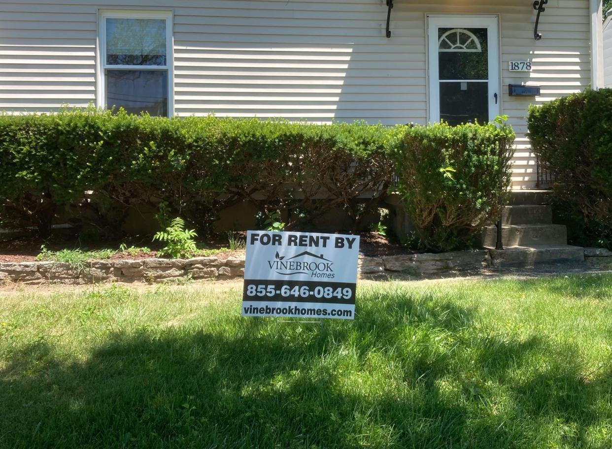 A for rent sign outside a house on Ashbrook Drive that's now owned by VineBrook Homes. VineBrook, an investment company, now owns at least 29 houses on the West Price Hill street.