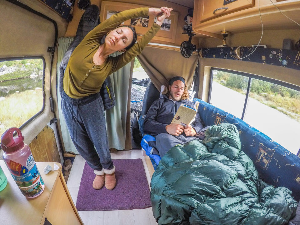 Brittany and Drew relaxing inside their van the day after summiting the highest peak in Norway, August 2017. (Photo: Courtesy of Mr. and Mrs. Adventure)