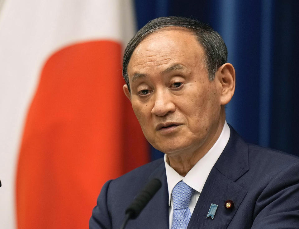 Japanese Prime Minister Yoshihide Suga speaks during a news conference at prime minister's official residence in Tokyo, Japan, Tuesday Aug. 17, 2021. Japanese Prime Minister Yoshihide Suga has officially expanded and extended the nation’s coronavirus state of emergency as government advisers recommend legal changes that would allow penalties for violations. (Kimimasa Mayama/ Pool via AP)