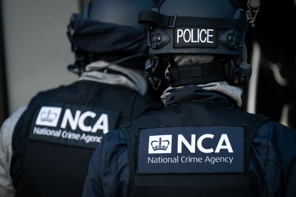 National Crime Agency officers (PA Wire)