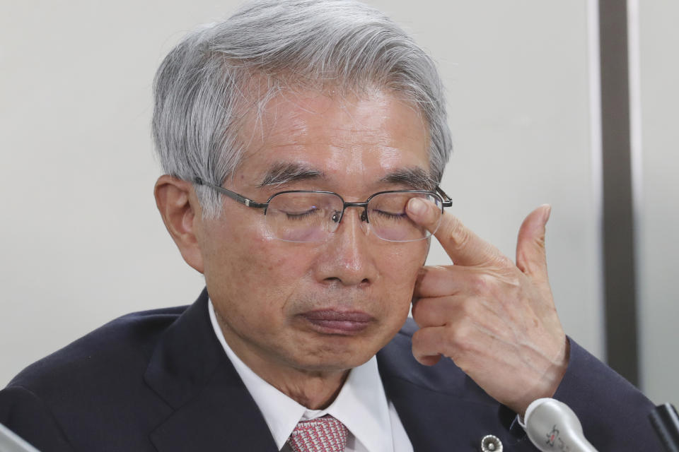 Junichiro Hironaka, a lawyer of former Nissan chairman Carlos Ghosn, attends a press conference in Tokyo, Thursday, Oct. 24, 2019. The lawyers of former Nissan Chairman Carlos Ghosn, who is awaiting trial in Japan, said Thursday they have requested that financial misconduct charges against him be dismissed. (AP Photo/Koji Sasahara)
