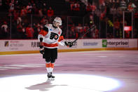 Philadelphia Flyers' Travis Konecny acknowledges fans after he was chosen as star of the game after an NHL hockey game against the New Jersey Devils, Saturday, April 13, 2024, in Philadelphia. (AP Photo/Derik Hamilton)