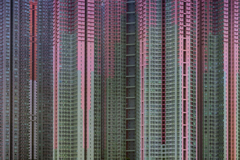 CORRECTS THAT WOLF DIED WEDNESDAY, NOT TUESDAY - The 2005 famed photograph titled "Architecture of Density' #39, showing massive housing by award-winning Hong Kong-based photographer Michael Wolf. Hong Kong art gallery director Sarah Greene said that Wolf, known for his work depicting mega-cities, has died Wednesday, April 24, 2019 at his home. She said he was 64. Wolf won first prize in the World Press Photo competition in 2005 and 2010. (Blue Lotus Gallery via AP)