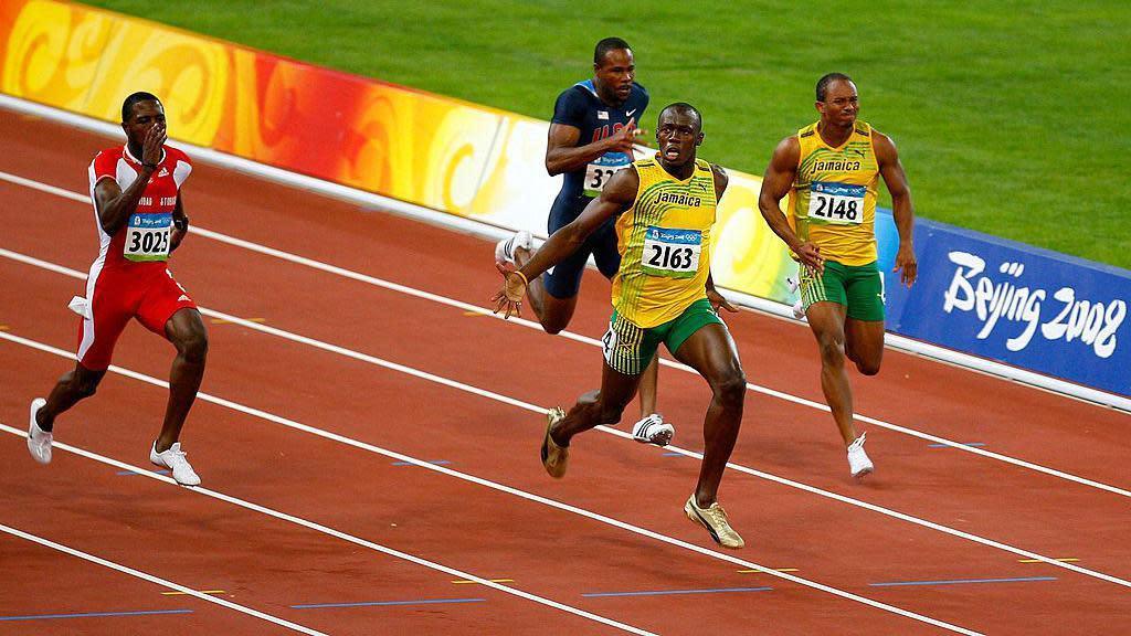 Usain Bolt running in the men's 100m at the 2008 Olympics
