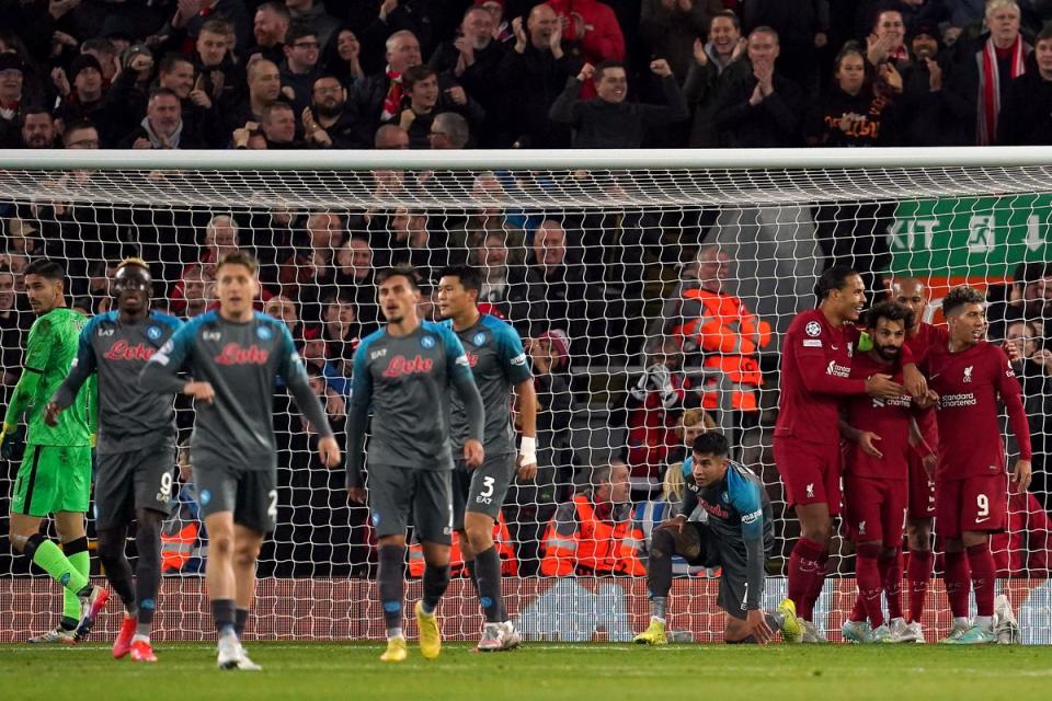 Mohamed Salah, third right, takes the plaudits after his landmark goal (Nick Potts/PA) (PA Wire)