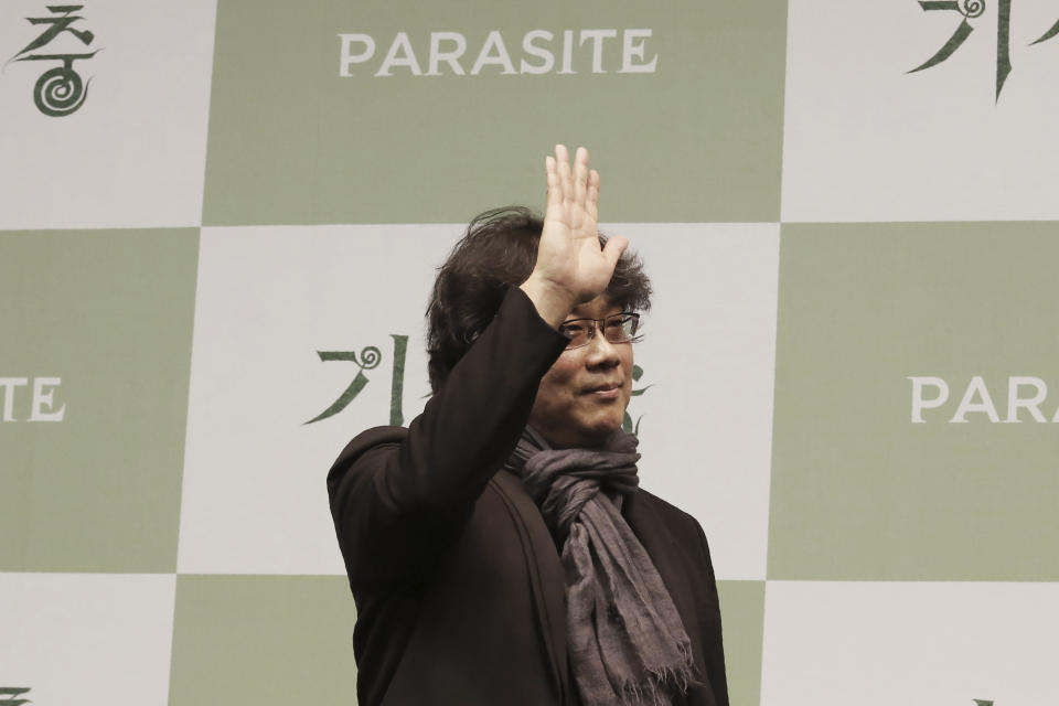 Bong Joon-ho, director of Oscar-winning “Parasite,” waves after a press conference in Seoul, South Korea, Wednesday, Feb. 19, 2020. Bong said Wednesday “the biggest pleasure and the most significant meaning” that the film has brought to him was its success in many countries though the audiences might feel uncomfortable with his explicit description of a bitter wealth disparity in modern society. (AP Photo/Ahn Young-joon)