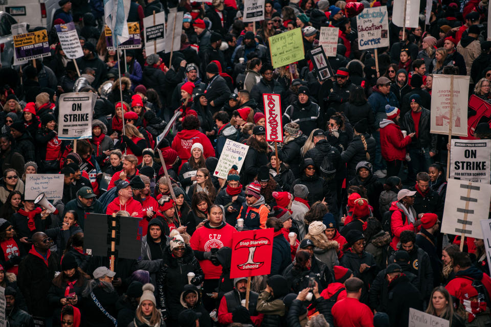 Thousands of demonstrators circle Chicago City Hall in a show of support for the ongoing teachers strike on Oct. 23, 2019. Unionized teachers and staff are demanding more funding from the city to lower class sizes, hire more support staff and build new affordable housing for the 16,000 students whose families are homeless.&nbsp; (Photo: Scott Heins via Getty Images)