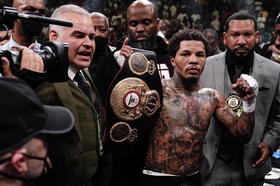 Gervonta Davis poses for photographs after a WBA lightweight championship boxing bout against Rolando Romero early Sunday, May 29, 2022, in New York. Davis won in the sixth round. (AP Photo/Frank Franklin II)