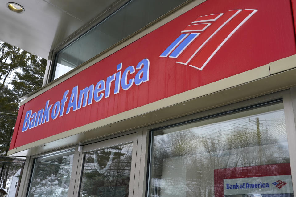 A Bank of America ATM is seen, Wednesday, Feb. 3, 2021, in Winchester, Mass. Bank of America topped Wall Street expectations for the third quarter Thursday, Oct. 14, 2021. Bank of America said net income rose 58% to $7.26 billion, or 85 cents a share. That topped the estimates of Wall Street analysts who were looking for earning per share of 70 cents, according to FactSet. (AP Photo/Elise Amendola)