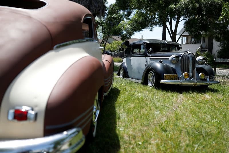 FILE PHOTO: Old vintage cars are seen on a lawn in Windsor, California