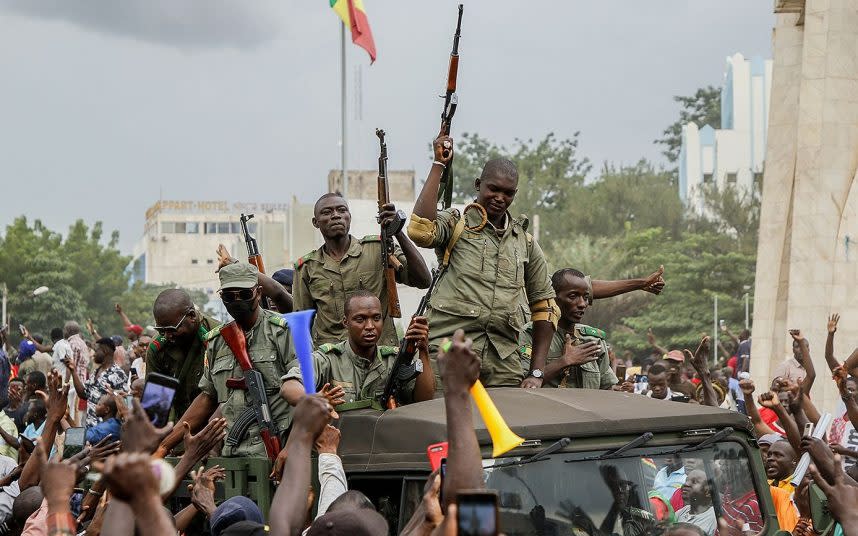 Malians celebrate as soldiers drive through Bamako - MOUSSA KALAPO/EPA-EFE