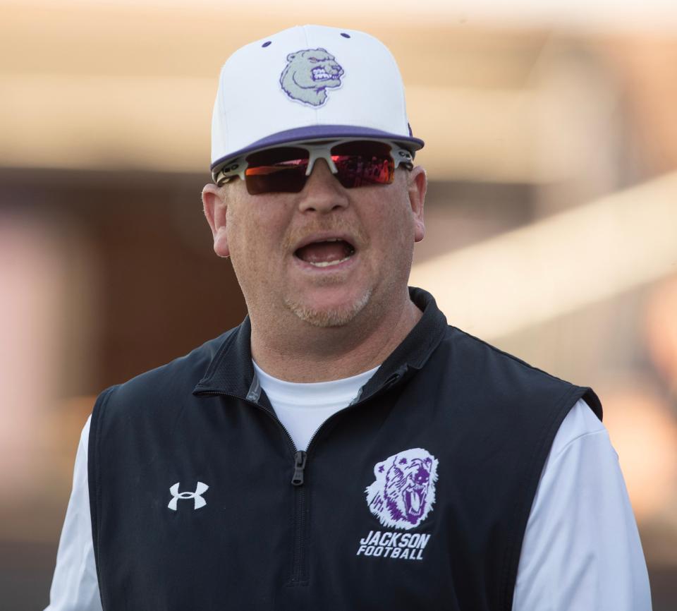 Jackson head coach Bill Gamble instructs his team during a high school baseball game against Hoover at Jackson on Wednesday, April 12, 2023.