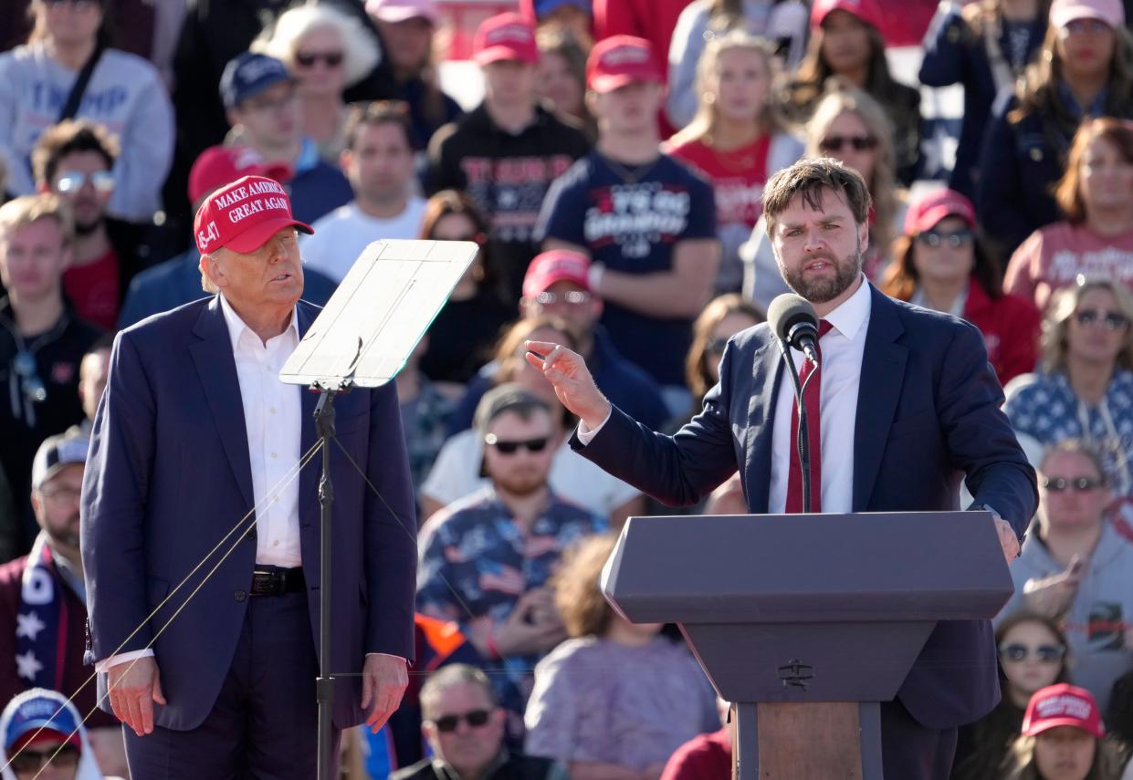 Former President Donald Trump appears with U.S. Senator JD Vance outside Wright Bros. Aero Inc at the Dayton International Airport on March 16, 2024 in Dayton, Ohio.