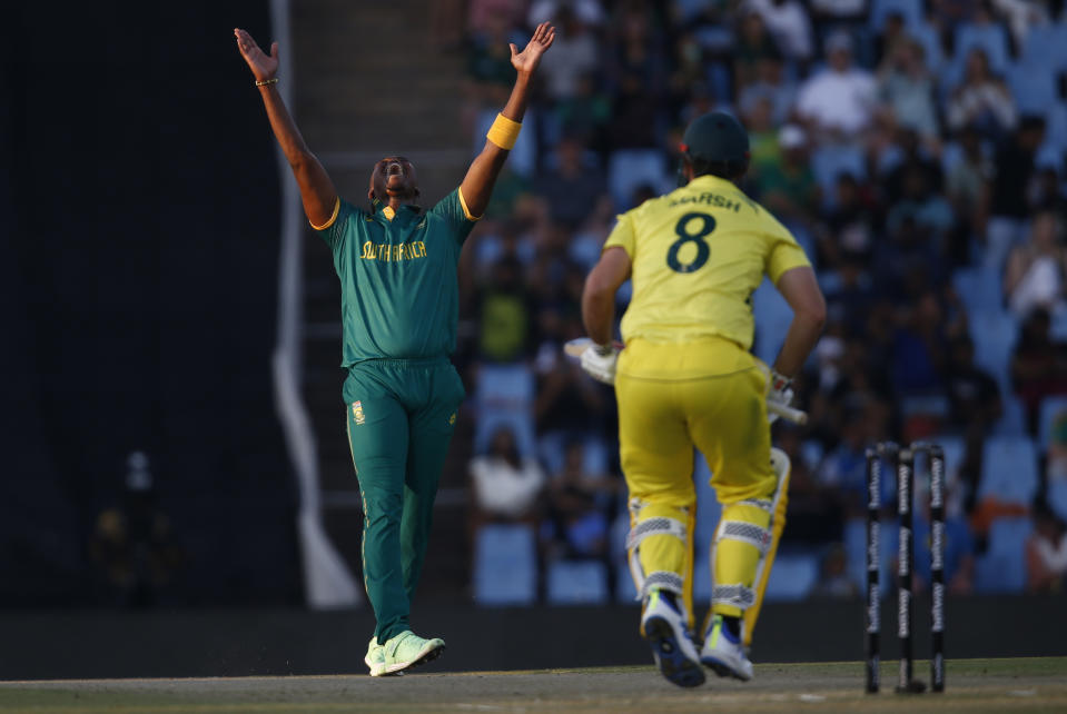 South Africa's Lungi Ngidi, left, celebrates after dismissing Mitch Marsh, right, during the fourth ODI cricket match between South Africa and Australia in Pretoria, South Africa, Friday, Sept. 15, 2023. (AP Photo)