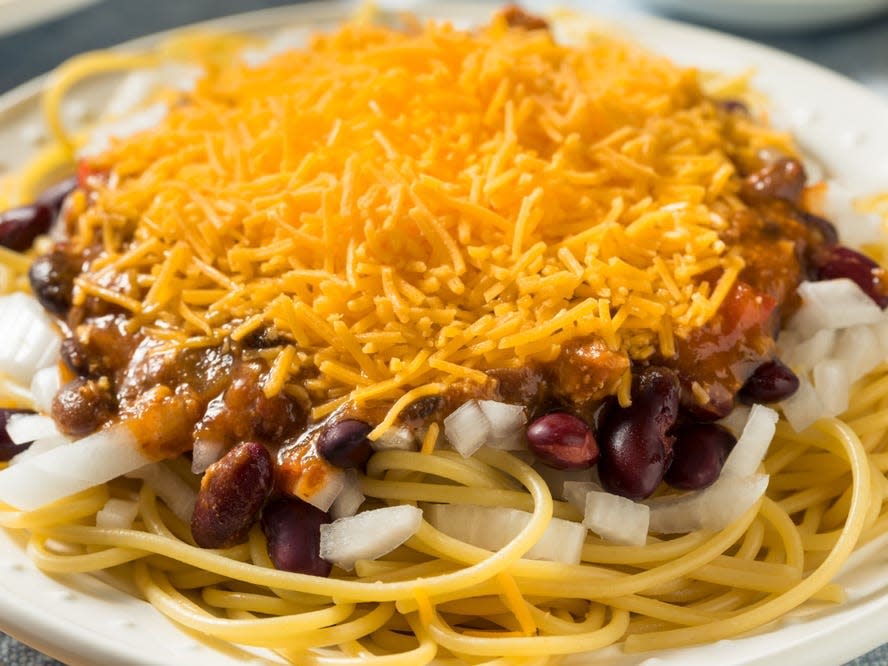 Cincinnati-style chili with spaghetti cheese and onions