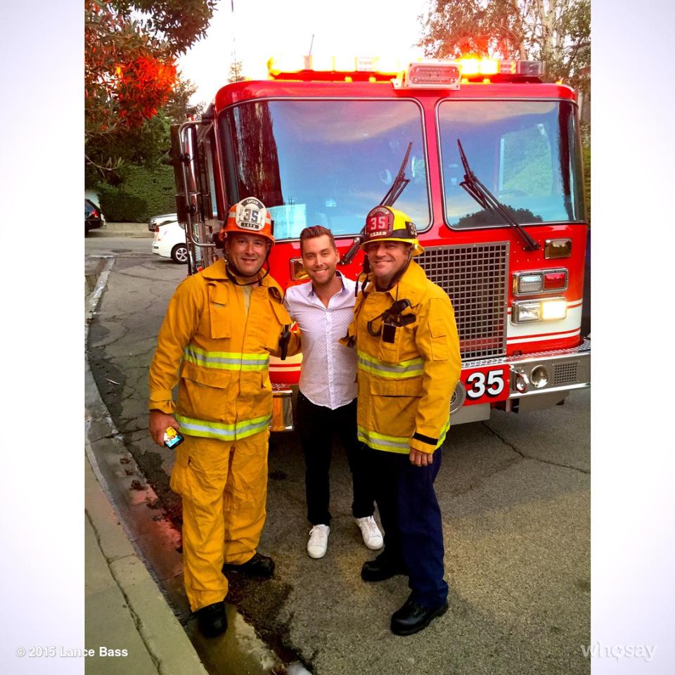 Lance Bass can breathe easy knowing his Los Angeles home is still standing. It was a close call, though, as a two-acre fire blazed through his Sherman Oaks neighborhood on Friday. <strong> WATCH: Lance Bass on Hooking Up with Andy Cohen: 'There Was No Andy D Going In My B' </strong> The former *NSYNC member captured video footage of a helicopter dousing the fire with gallons of water. "Firefighters protecting my house right now!" Bass wrote on Instagram. "Thanks fellas!" Thanks, fellas, indeed! Firefighters responded to the scene, ceasing the flames before any major damage was done. The brave crew managed to contain the fire within two hours, according to local TV station KTLA. Due to the dire drought conditions in California, a number of wildfires have prompted "a state of emergency." <strong> WATCH: Surfer Mick Fanning Survives a Shark Attack During a Competition in South Africa</strong> As Bass knows, the crews sent out to protect local residences are doing an incredible job during these rough summer months. "Thanks to these fine men and the rest of the firefighters / police that helped save our neighborhood today!" he tweeted after the incident. Lance has a lot to be grateful for these days, including his husband, Michael Turchin. See how sweet they are together here: