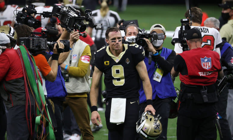 Drew Brees walks off the field for the final time.