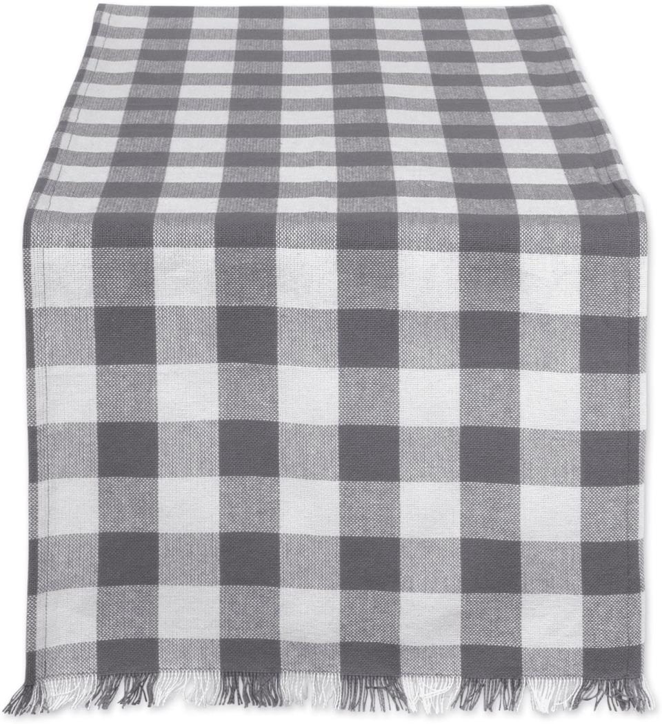 DII 100% Cotton, Machine Washable, Heavyweight Woven Fringed Table Runner for Everyday Use, Fall & Holidays. Image via Amazon. 