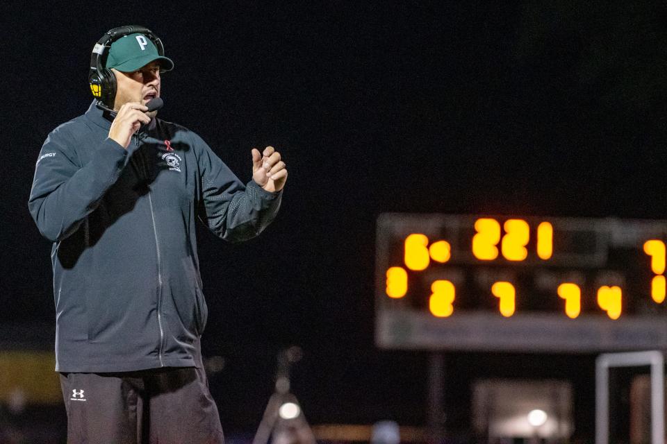 Pennridge head coach Chuck Burgy calls a play late in the Rams' 7-6 loss to Neshaminy on September 30.