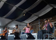 NEW ORLEANS, LA - APRIL 28: Carolina Chocolate Drops performs during the 2012 New Orleans Jazz & Heritage Festival Day 2 at the Fair Grounds Race Course on April 28, 2012 in New Orleans, Louisiana. (Photo by Rick Diamond/Getty Images)