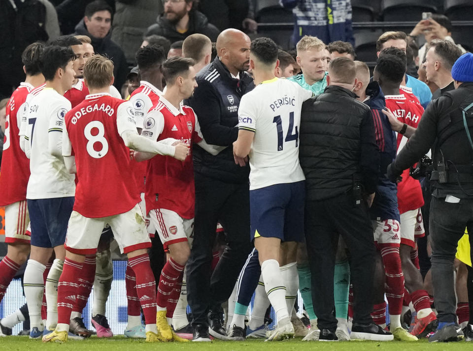 Players are in incident during the English Premier League soccer match between Tottenham Hotspur and Arsenal at the Tottenham Hotspur Stadium in London, England, Sunday, Jan. 15, 2023. (AP Photo/Frank Augstein)