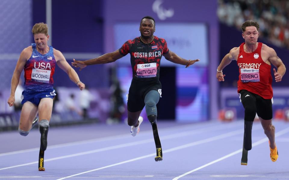 Sherman Isidro Guity Guity wins the men's 100m T64 final