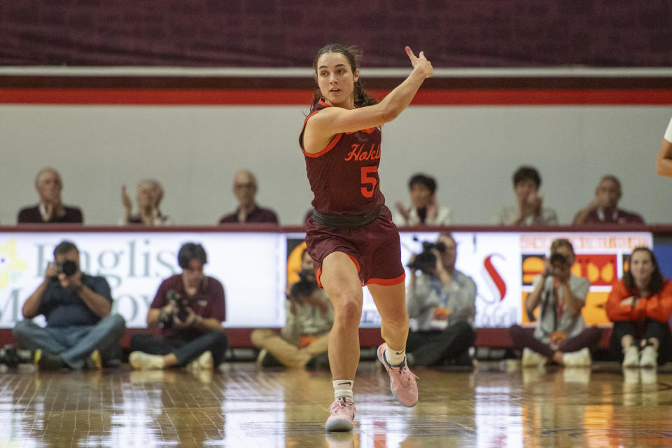 Virginia Tech's Georgia Amoore celebrates after hitting a 3-pointer during the second half of an NCAA college basketball game against North Carolina State, Sunday, Jan. 7, 2024, in Blacksburg, Va. (AP Photo/Robert Simmons)