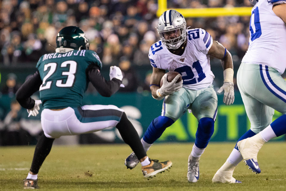 Dec 22, 2019; Philadelphia, Pennsylvania, USA; Dallas Cowboys running back Ezekiel Elliott (21) runs with the ball against Philadelphia Eagles free safety Rodney McLeod (23) at Lincoln Financial Field. Mandatory Credit: Bill Streicher-USA TODAY Sports