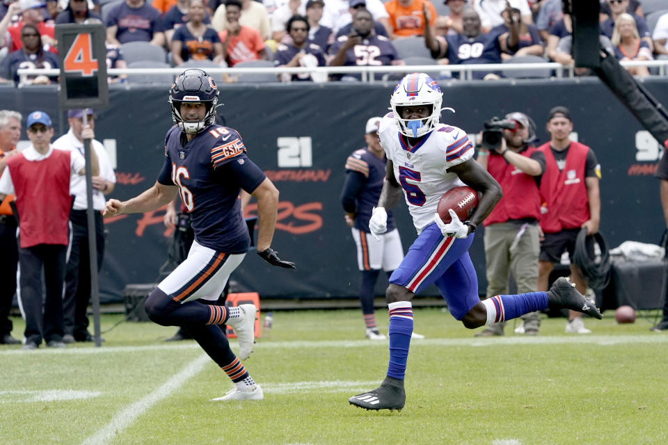 Buffalo Bills' Marquez Stevenson (5) returns Chicago Bears punter Pat O'Donnell's punt, right, for a touchdown during the second half of an NFL preseason football game Saturday, Aug. 21, 2021, in Chicago. (AP Photo/David Banks)