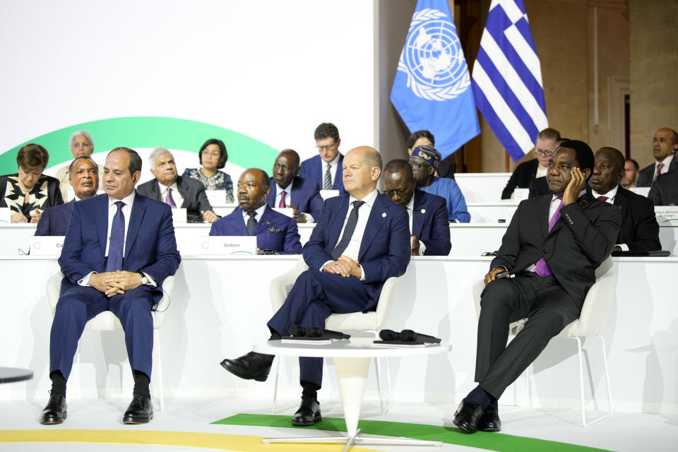 CORRECTS SPELLING OF NAME Egyptian President Abdel Fattah el-Sissi, left, German Chancellor Olaf Scholz and Zambian President Hakainde Hichilema listen during the closing session of the New Global Financial Pact Summit, Friday, June 23, 2023 in Paris. The aim of the two-day climate and finance summit was to set up concrete measures to help poor and developing countries whose predicaments have been worsened by the devastating effects of the COVID-19 pandemic and the war in Ukraine better tackle poverty and climate change. (AP Photo/Lewis Joly, Pool)