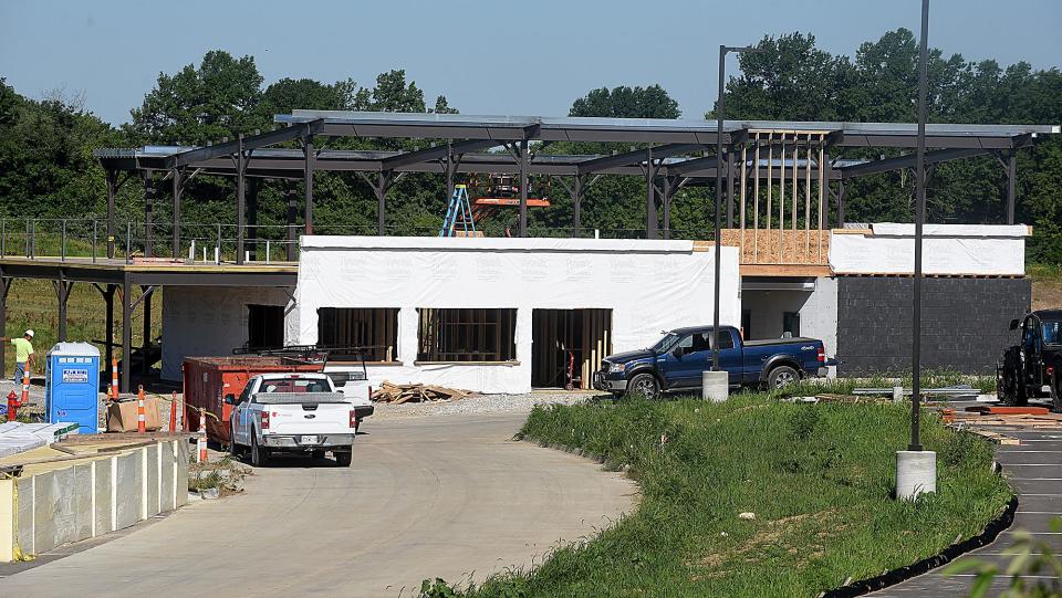 Construction continues on the Lakeside Ashland, which will be the home of outdoor festivals, concerts and movies located near the Route H roundabout on Log Providence Road.