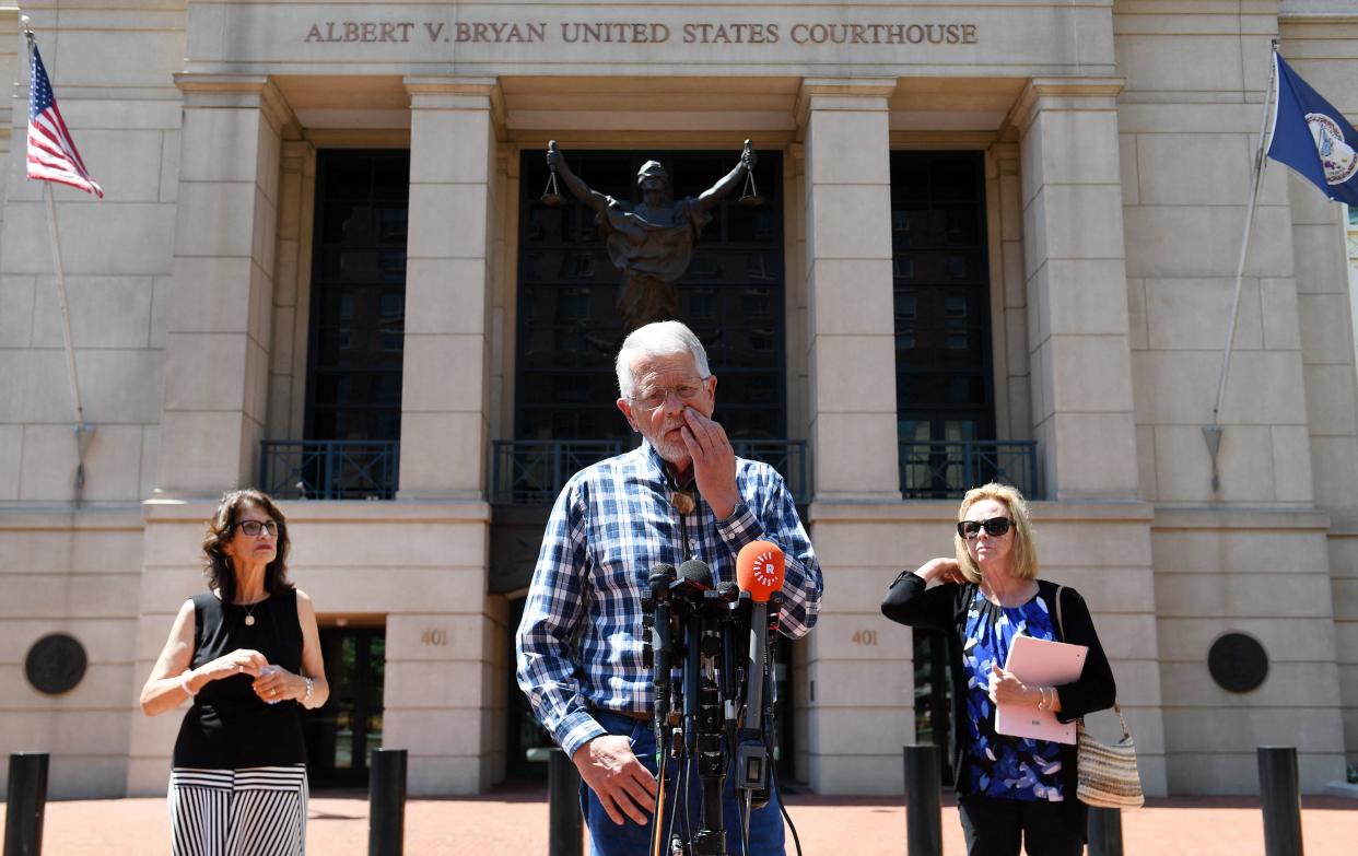 Diane Foley (left), the mother of James Foley, and Carl and Marsha Mueller, the parents of Kayla Mueller, speak to reporters after the sentencing.
