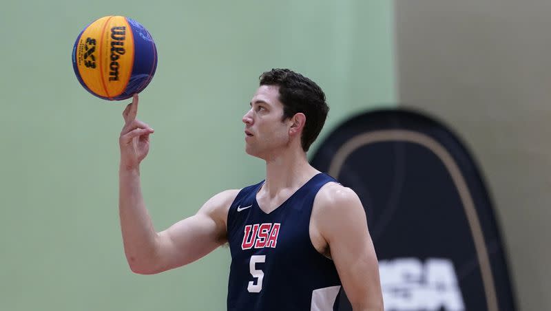 Jimmer Fredette spins the basketball during practice for the USA Basketball 3x3 national team on Monday, Oct. 31, 2022, in Miami Lakes, Fla.