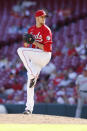 Cincinnati Reds' Jeff Hoffman winds up to pitch against the Washington Nationals during the ninth inning of a baseball game Sunday, Sept. 26, 2021, in Cincinnati. (AP Photo/Jay LaPrete)