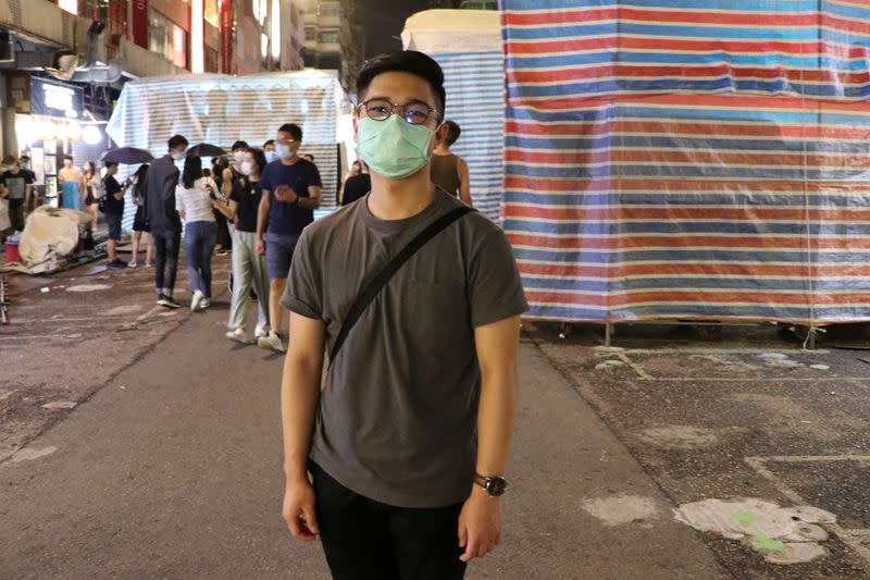 Lui, 22, poses for a photo after an interview with Reuters at Mong Kok, in Hong Kong