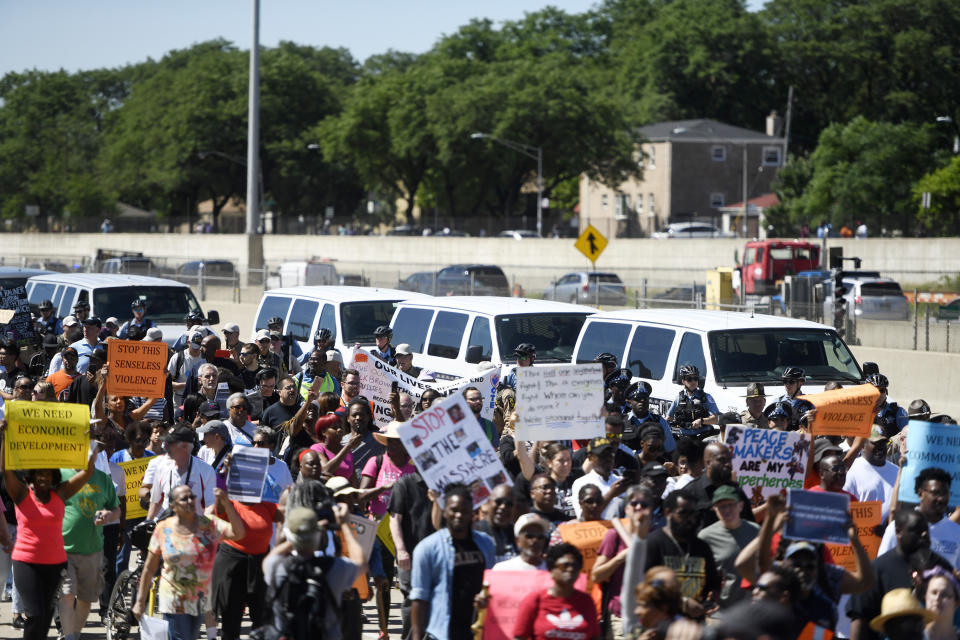FILE - In this July 7, 2018, photo, protesters march on the Dan Ryan Expressway in Chicago. The protesters shut down the expressway in an attempt to increase pressure on public officials to address the gun violence that's claimed hundreds of lives in some of the city's poorest neighborhoods. Chicago officials have issued parking bans and are warning motorists of rolling street closures ahead of a rush-hour protest march along the city's always busy Lake Shore Drive. Protesters plan to gather on the thoroughfare Thursday afternoon, Aug. 2 and march north toward Wrigley Field. (AP Photo/Annie Ricem, File)