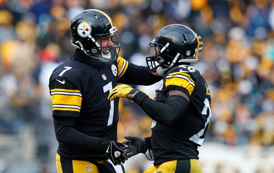 PITTSBURGH, PA - JANUARY 08:  Le'Veon Bell #26 of the Pittsburgh Steelers is greeted by Ben Roethlisberger #7 after he rushed for a touchdown in the first half during the Wild Card Playoff game against the Miami Dolphins at Heinz Field on January 8, 2017 in Pittsburgh, Pennsylvania. (Photo by Justin K. Aller/Getty Images)